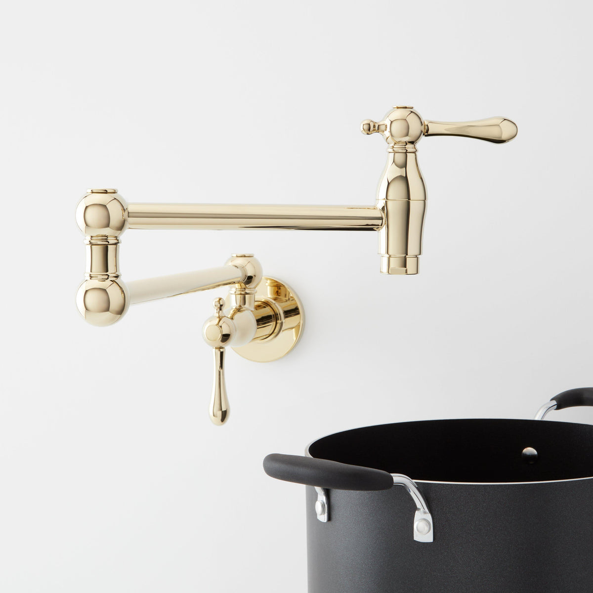 Traditional Retractable Wall-Mount Pot Filler Faucet - Polished Brass